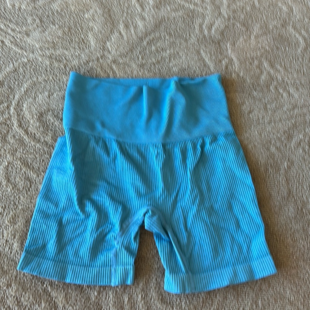 Used workout shorts, stretchable size small. No rips or tears.